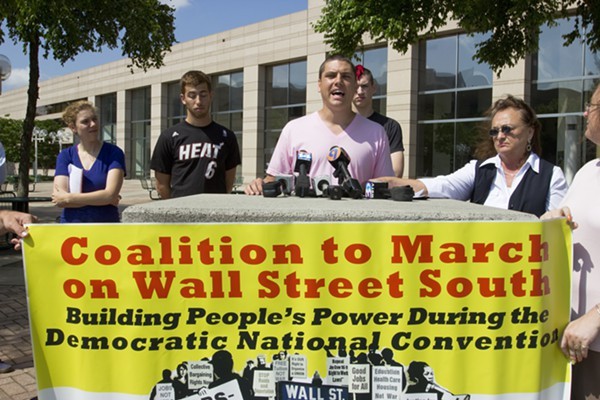 Michael Zitkow, member of the Coalition to March on Wall Street South, spoke during a press conference on Wednesday.