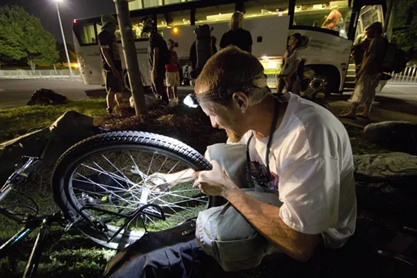 Protesters from the RNC arrive and inspect their belongings.