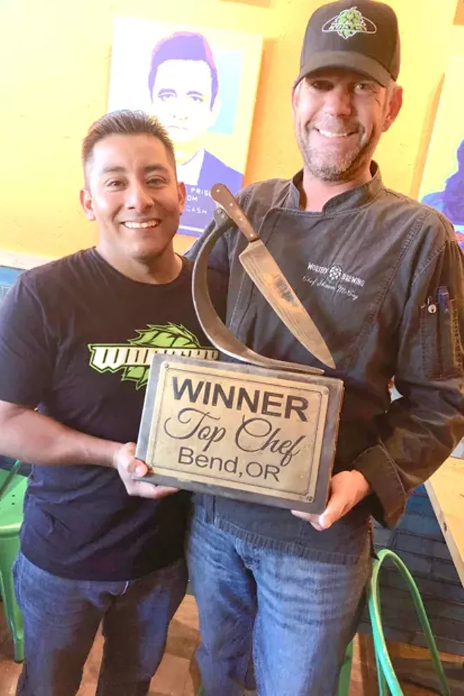 Chef Juan Infante and Sous Chef Shawn McCoy are all smiles, holding the Top Chef trophy at Worthy Taps & Tacos June 18. - NICOLE VULCAN