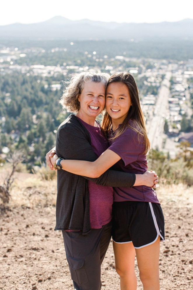 Robin and Hai Xing Lewis atop Pilot Butte. - NATALIE STEPHENSON