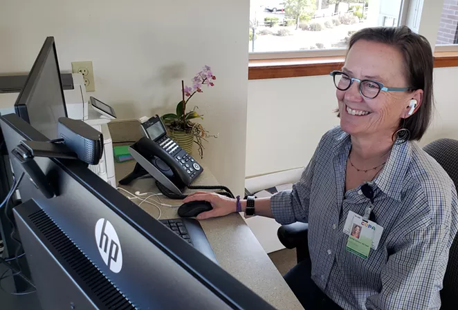 Dr. Carolyn Guttman, pediatrician at COPA, at her Zoom station. - COURTESY COPA