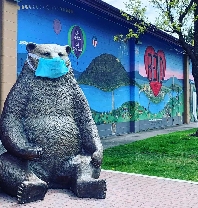 The big bear outside of Newport Avenue Market encourages mask-wearing. - MICHELLE TAGER MCCARTHY