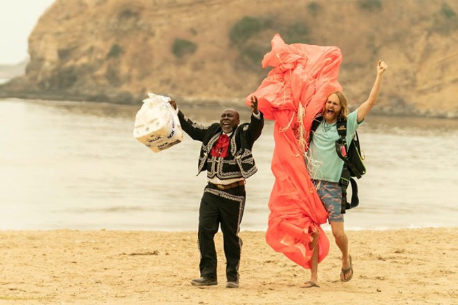 Is that man dressed like a mariachi on the beach and carrying a pack of toilet paper? Watch and see! - COURTESY AMC