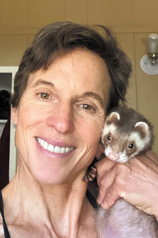 Casey Pivcevich poses with her pet ferret, Dude. - COURTESY CAREY PIVCEVICH