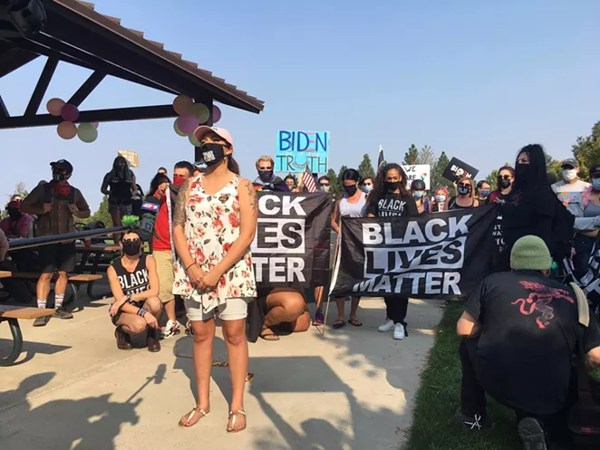 Kerstin Arias makes a speech to other activists at Pilot Butte on Oct. 3. - KERSTIN ARIAS