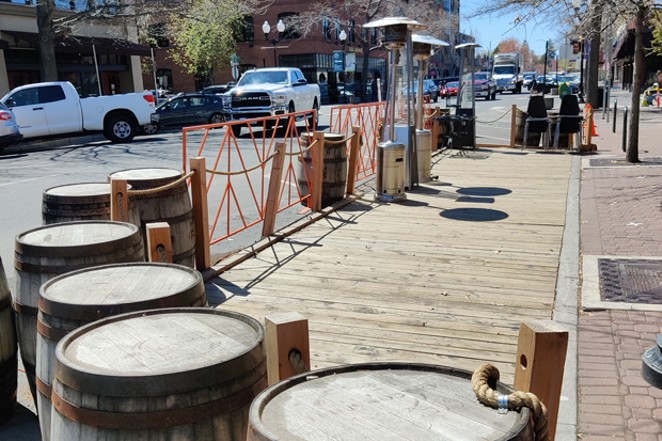 If downtown parklets like this one at Zydeco Kitchen &amp; Cocktails prove to be a success, they could become permanent. - JACK HARVEL