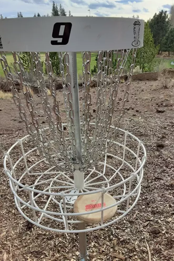 The sweet sound of a disc hitting chains can be heard at Bend's newest disc golf course. - COURTESY TREVOR BRADFORD