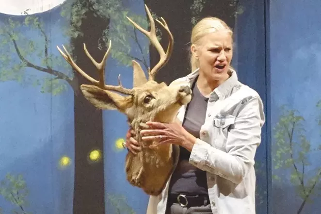 Emmy (Jennifer Matthey) holds onto "Harvey" as she helps her parents pack up the house. - CREDIT ELIZABETH WARNIMONT