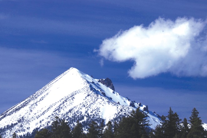 A cloud poised to take a bite out of Mt. McLoughlin. - DAMIAN FAGAN
