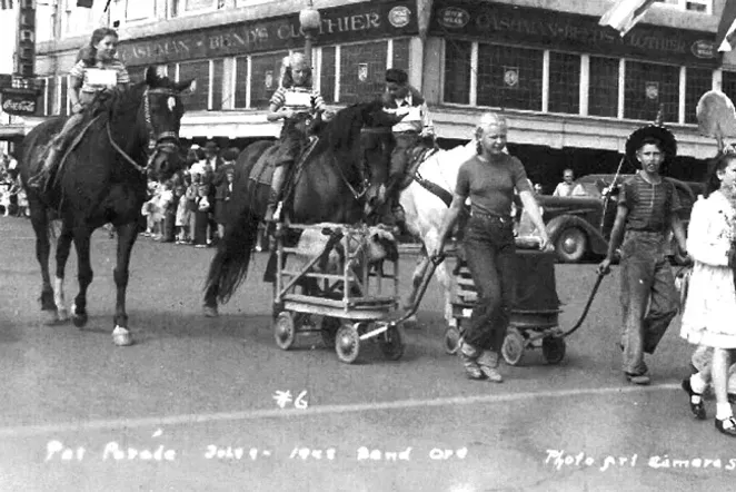 Pet Parade; Fourth of July, 1948; Bend; Photo Art Camera Shop; Three children on horses and children pullings wagons with farm animals; one child carrying shovel. - COURTESY DESCHUTES COUNTY HISTORICAL
