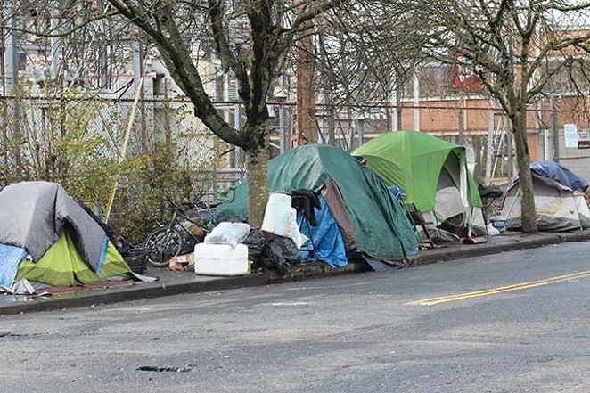 Encampment on city street. - COURTESY WIKICOMMONS