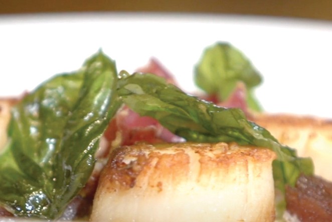 Pickled celery and arugula are perfect accompaniments to seared scallops. - COURTESY DONNA BRITT
