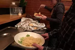Spaghetti wrestlers can get their fill at Tin Pan Theater. - LISA SIPE