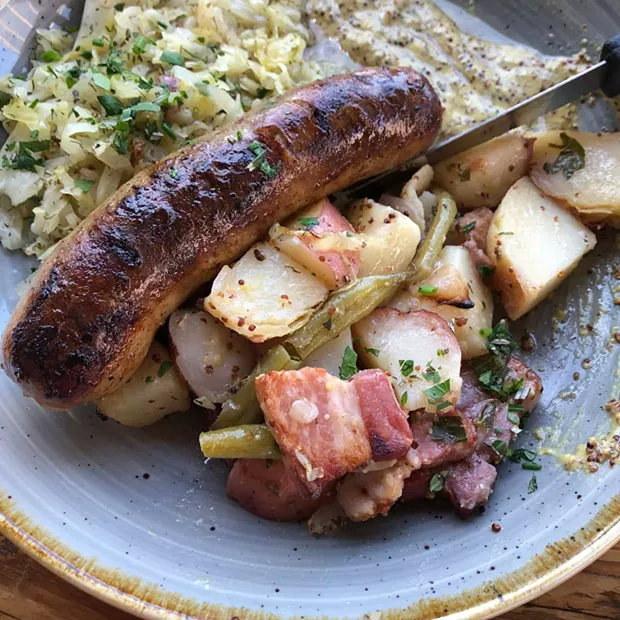 pFriem's proper bratwurst and delicious sides. - SUBMITTED