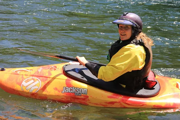 Beth Junkins gets ready to send it on the McKenzie River. - K.M. COLLINS