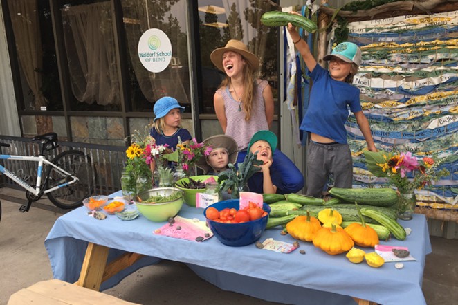 Kindergarteners from the Waldorf School of Bend staff their own "farmers market" from the school's garden. - WALDORF SCHOOL OF BEND