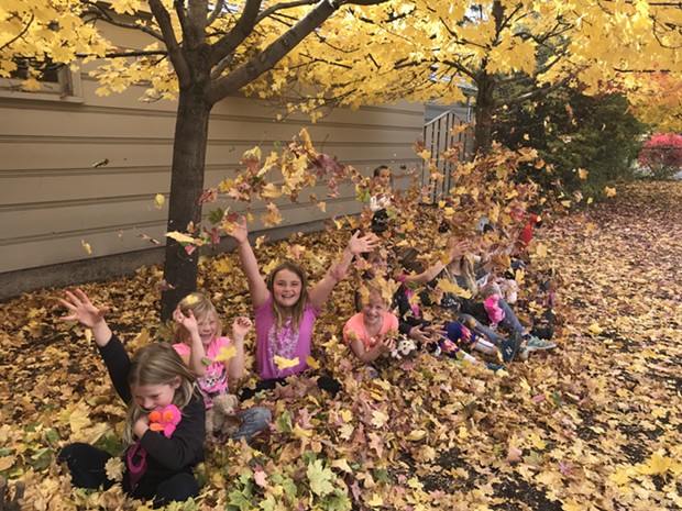 Kids at Highland Elementary play in the leaves during their time in Bend Park and Recreation District's Kids Inc. program. - BEND PARK AND RECREATION DISTRICT