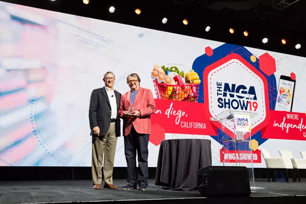 Rudy Dory accepts his award at the 2019 National Grocers Association Show. - SOFIA NEGRON
