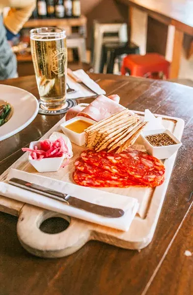 Along with freshly cut meats to take home to prepare, modern day meat markets offer sit-down food service. - TAMBI LANE PHOTOGRAPHY