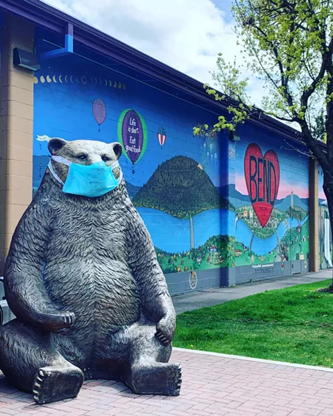 The big bear outside of Newport Avenue Market encourages mask-wearing. - MICHELLE TAGER MCCARTHY