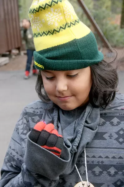 This Outdoor School student is the recipient of the “Purple Bead Award” earned for his house-keeping and cooperative excellence at Camp Tamarack Outdoor School. - JIM ANDERSON