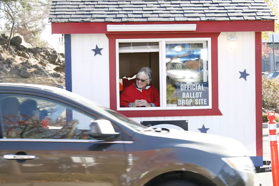 Deschutes County's drive-through ballot drop site was a busy place Nov. 6. - CHRIS MILLER