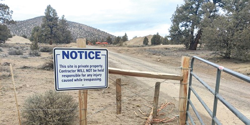 A sign posted outside the construction area of the proposed Thornburgh Resort southwest of Redmond.