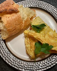 The perfection of scrambled eggs with a simple baguette.