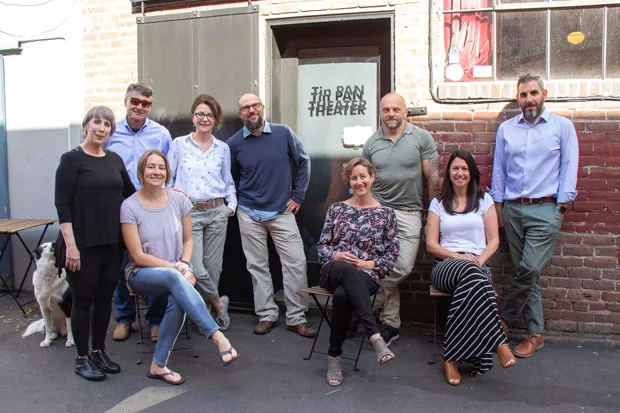 The BendFilm staff and board of directors outside of the Tin Pan Theater on May 7. BendFilm recently bought the indie theater and took over operations on May 1. - KEELY DAMARA