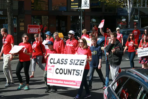 Students and adults marched in downtown Bend on May 8. - BRON WICKUM