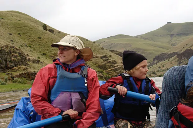 Beth Jacobi and son Orion row a raft down the John Day River together. - COURTESY BETH JACOBI