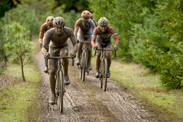 A group rides in the mud during the Cyclocross Crusade at Barton County Park in Barton, Oregon, in 2015. - MATTHEW LASALA