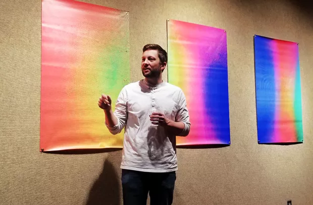 Artist Kiel Fletcher discussing his work, exhibiting now at Pence Pinckney Gallery on the COCC campus. - CARI BROWN