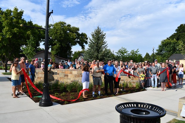 Locals observe the ribbon cutting at the official opening of the Centennial Park extension, August 2019. - CITY OF REDMOND