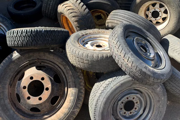 Threadbare tires ready for shredding. - SUZANNE JOHNSON