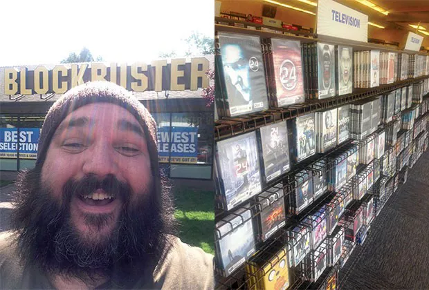 The Source's own blockbuster, film critic Jared Rasic, revels in being an actual customer of The Last Blockbuster. - JARED RASIC