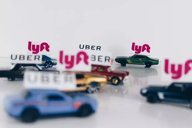Lyft and Uber drivers dominate the roads on major drinking holidays, but how lucrative is the gig the rest of the time? - UNSPLASH