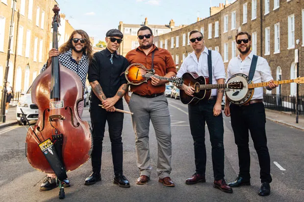 Larry and His Flask band members, from left to right: Jeshua Marshall, Jamin Marshall, Kirk Skatvold, Ian Cook and Andrew Carew. - BEN MORSE