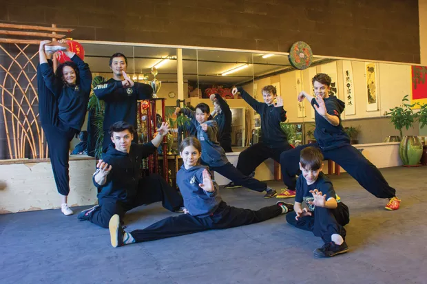 Master JianFeng Chen and Oregon Tai Chi Wushu students prepare for an upcoming IWUF competition. - DARRIS HURST