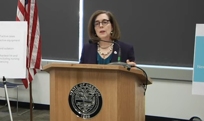 Gov. Kate Brown describes a number of conditions that must be met before opening up Oregon's economy. These include PPE supplies, more testing, more contact tracing, isolation plans and plans for people without homes and people that live in nursing homes. - SCREENSHOT VIA YOUTUBE - OREGON PUBLIC HEALTH DIVISION CHANNEL