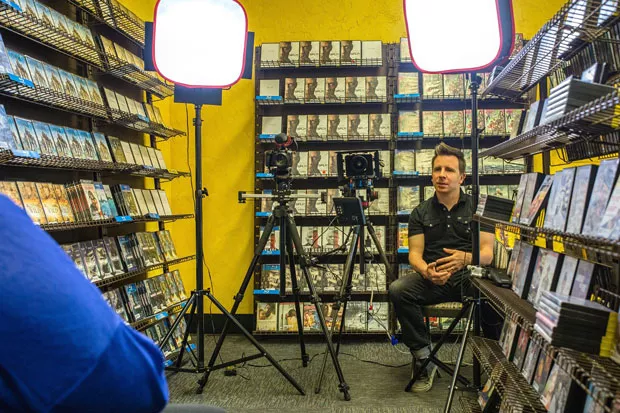 Filming inside The Last Blockbuster. - PHOTO BY GARY EIDSMOE