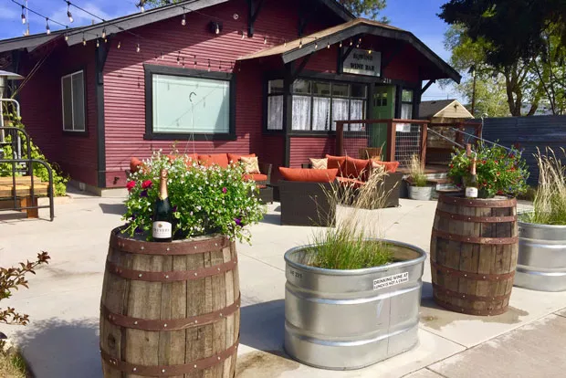 The patio at the new Eqwine Wine Bar looks inviting. - EQWINE WINE BAR