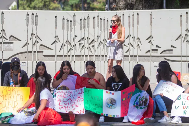 Demonstrators gathered at Greenwood and Wall streets, and later in Drake Park Saturday, in solidarity with the families of the two men detained by Immigration and Customs Enforcement Aug. 12. Speakers called for the community to "support due process" for the two detained men. Speakers also called for Mayor Sally Russell to "see to the safety & well being of all community members, regardless of immigration status." - KYLE SWITZER