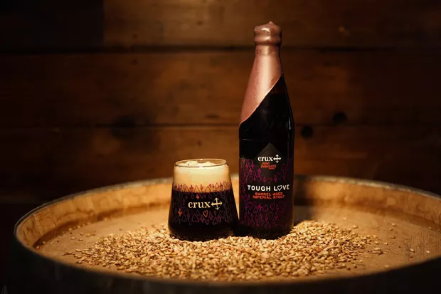 Tough Love 2020, along with its new commemorative glass. - COURTESY CRUX FERMENTATION PROJECT/FACEBOOK