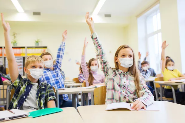 Oregon is one of only eight states in the U.S. that has statewide COVID-19 metric mandates for school districts instead of recommendations. This means students around the country have returned to the classroom. - ADOBE STOCK