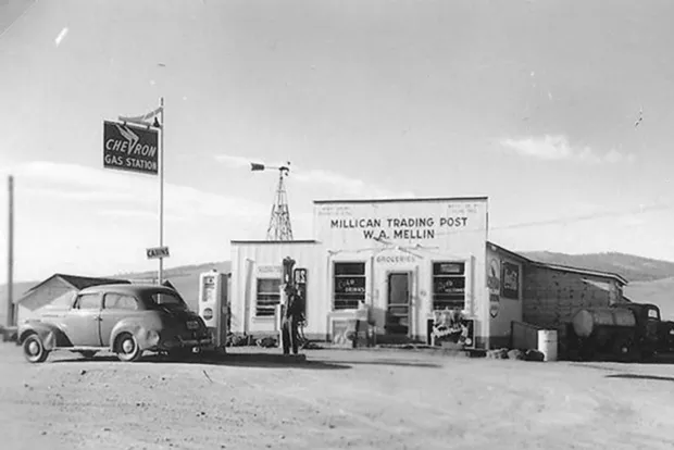 Bill Mellin stands at the Millican Trading Post. He operated the store starting in 1945, until his murder in 1988 by an employee. - BOWMAN MUSEUM
