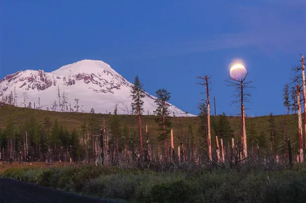 Now that's a lunar eclipse! Over South Sister! @art_of_adventures shared this photo with us of the May 26 blood moon eclipse. Tag us @sourceweekly for a chance to be featured here and in the Instagram of the Week in the Cascades Reader—plus now, get a framed print of your piece courtesy of High Desert Frameworks. - @ART_OF_ADVENTURES / INSTAGRAM