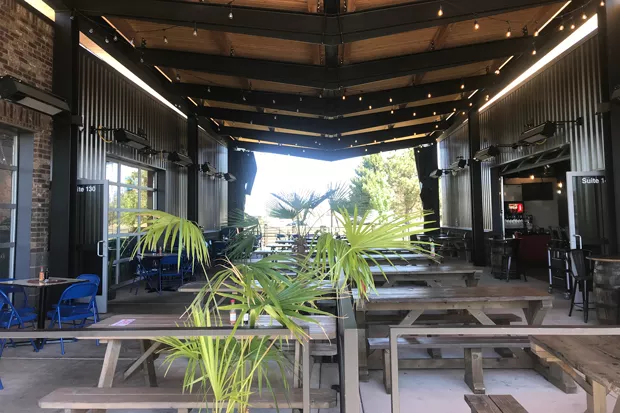 The spacious new food patio at 1462 NE Cushing Drive. - SUBMITTED