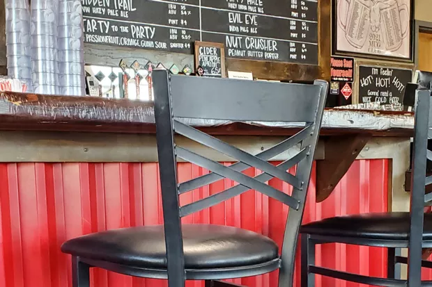 Cozy up to the bar inside Wild Ride Brewing. - SUBMITTED