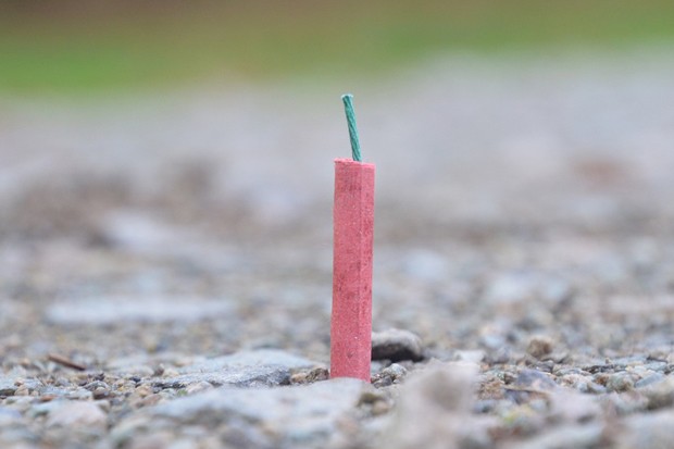 All fireworks, like this firecracker standing up in gravel, could be permanently banned in Bend. - TREVOR205 / PIXABAY